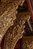 Wat Xieng Thong temple in Luang Prabang, Laos. the Ho Tai, the library. Detail of the console of the roof. 